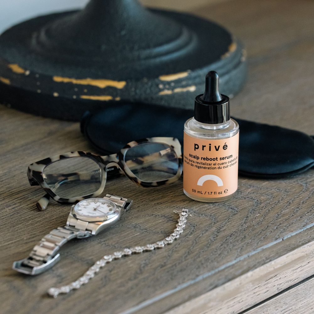 privé pro scalp reboot serum - product on nightstand