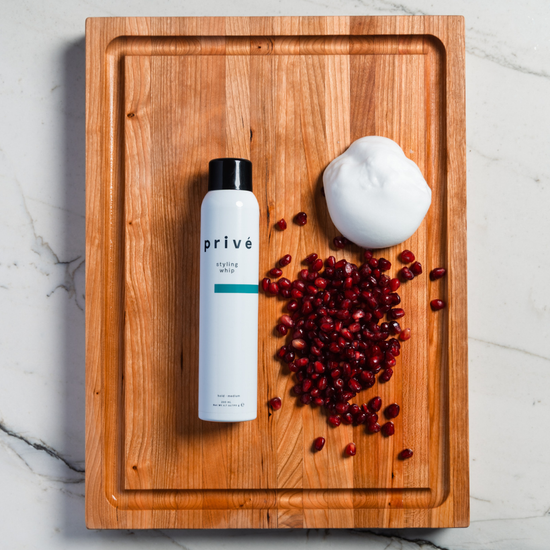 privé pro styling whip - product on wood & ingredients